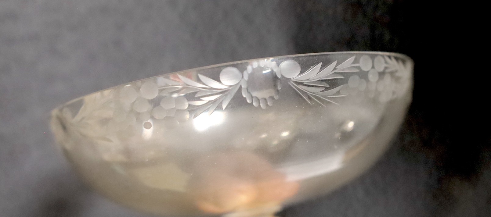 A set of eight sterling dessert coupes with glass inserts, height 6mm, together with a modern silver mounted decanter, by Asprey & Co Ltd (lacking stopper - one glass insert missing)